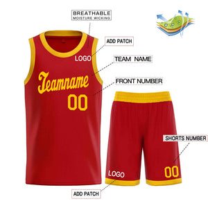 Le classique jaune rouge fait sur commande place le maillot uniforme de basket-ball de sports