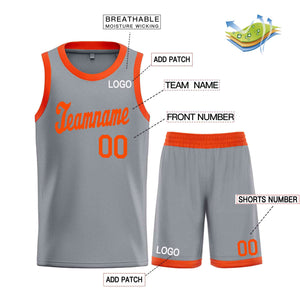 Le classique orange gris foncé personnalisé définit le maillot de basket-ball uniforme de sport