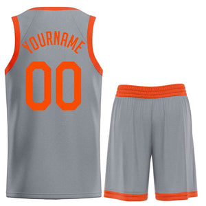 Le classique orange gris foncé personnalisé définit le maillot de basket-ball uniforme de sport