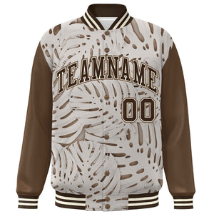 Custom Light Brown Brown-Cream Maple Leaf Raglan Sleeves Bomber Graffiti Pattern Varsity Jacket